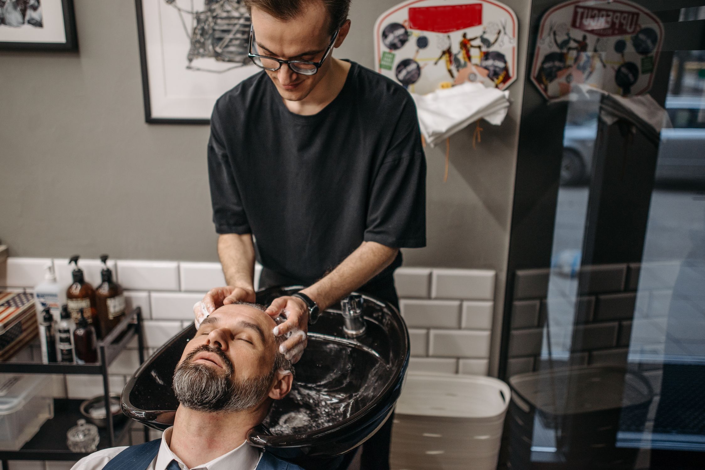 A Barber Shampooing A Client Free Stock Photo a-barber-shampooing-a-client-free-stock-photo