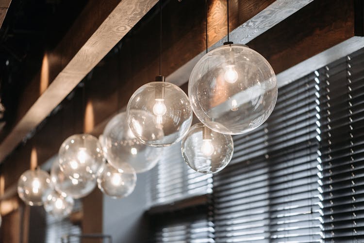 A Hanging Glass Ball With Lights 