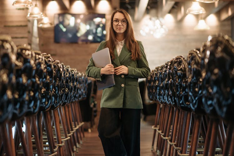 Elegant Businesswoman In Restaurant