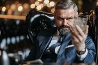 An Angry Man Staring at the Whiskey Glass
