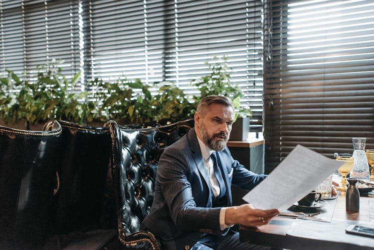 A Businessman Reviewing Some Documents