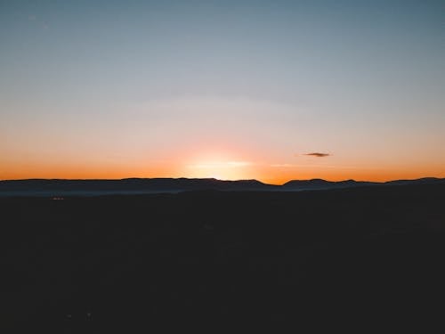 Silhouette of a Mountain during Sunset