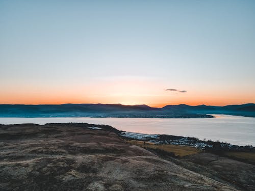 View of a Coastal Town at Sunset