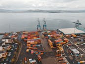 An Aerial Photography of Cargo Containers Near the Ocean