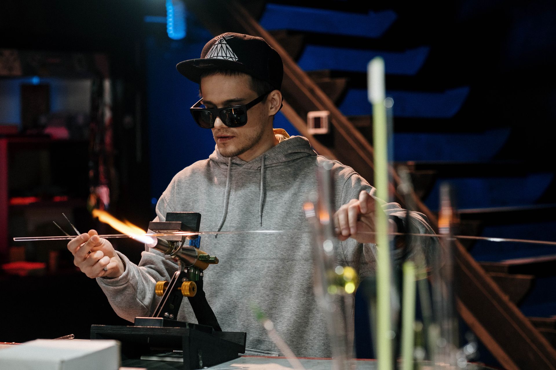 Man Using a Burner for Manufacturing Glass Items in a Workshop