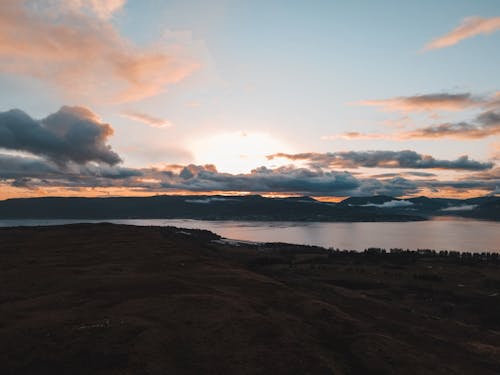 Sunlight over Clouds on Sea Shore