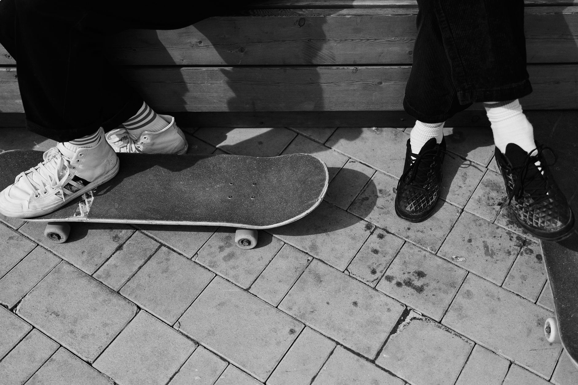 Cockfight Skateboards logo and vintage deck displayed beside a concrete pool in Houston, Texas