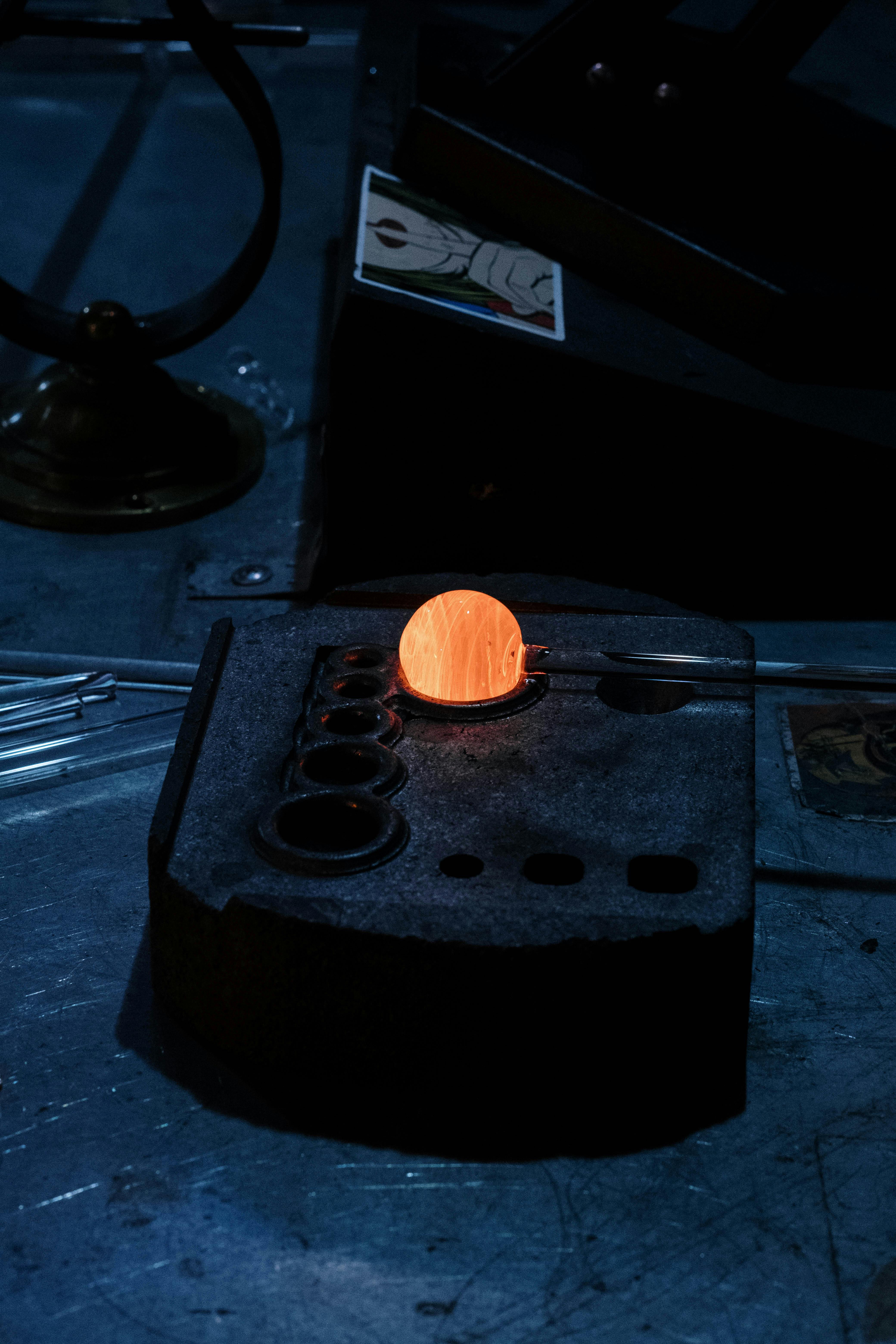 close up of glass item being made in a glassblowing workshop