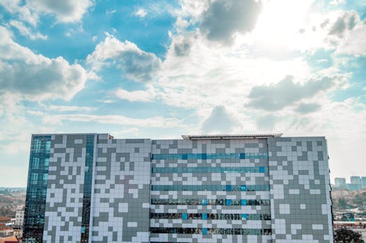 Contemporary high-rise facade under bright sky in Nairobi, Kenya.