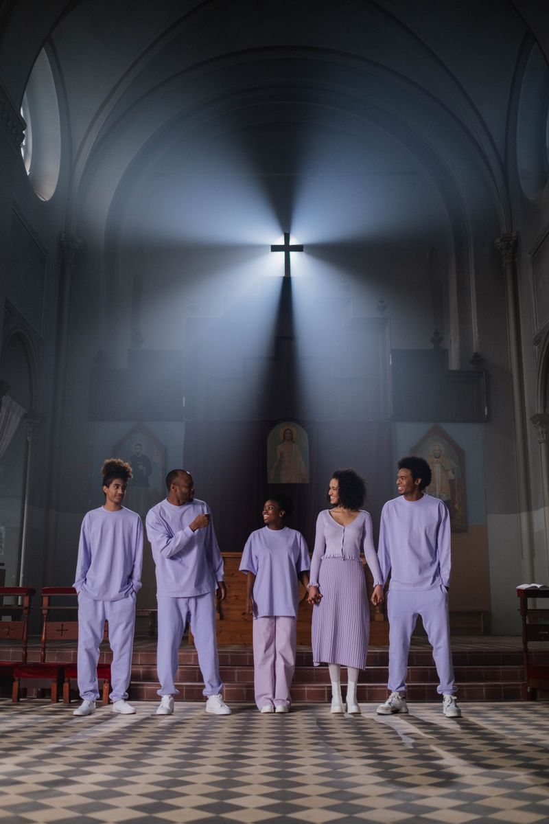 Choir standing before the altar in sunlight