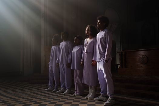 Choir Standing in front of the Altar