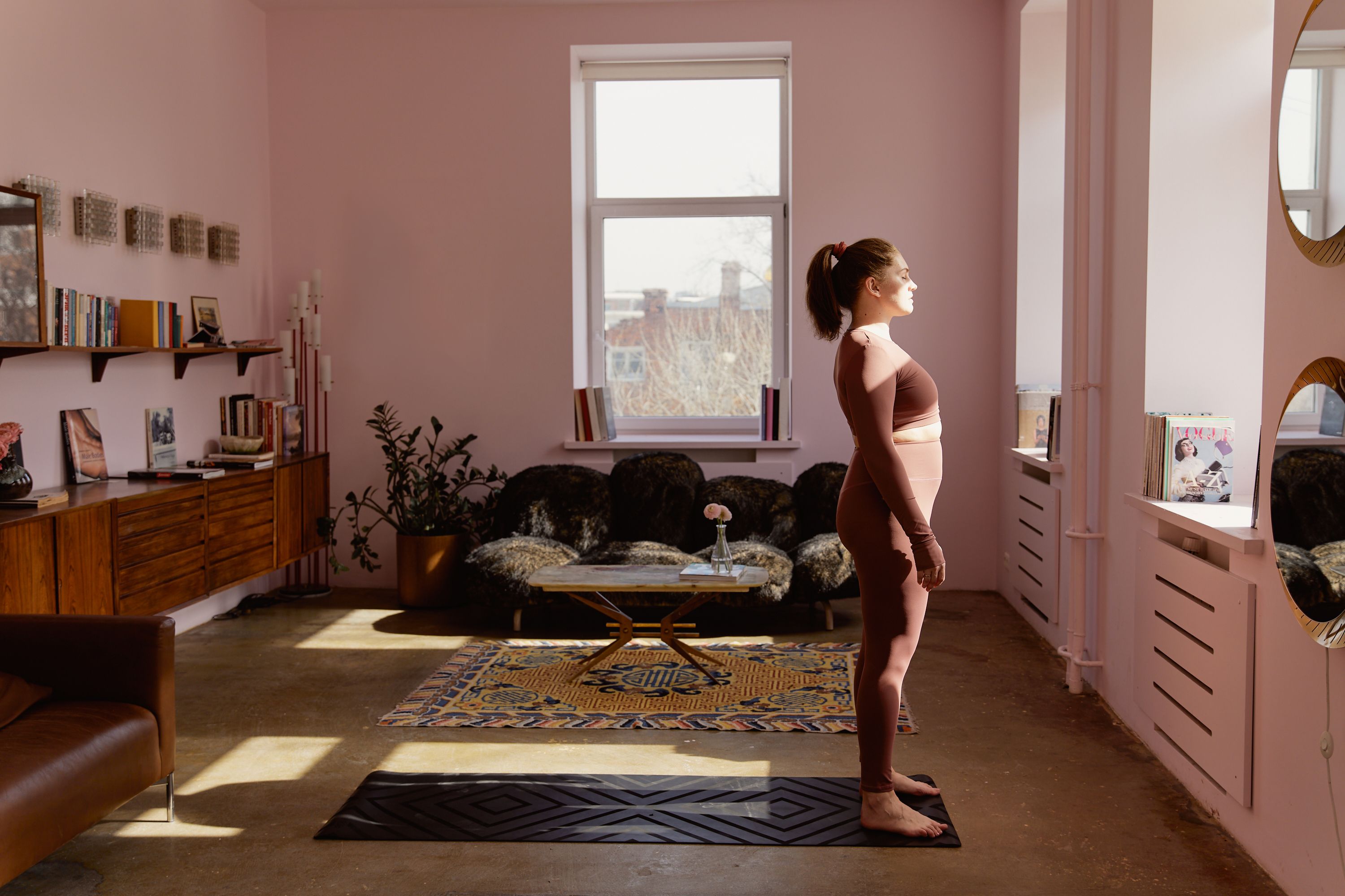 person breathing exercise calm room