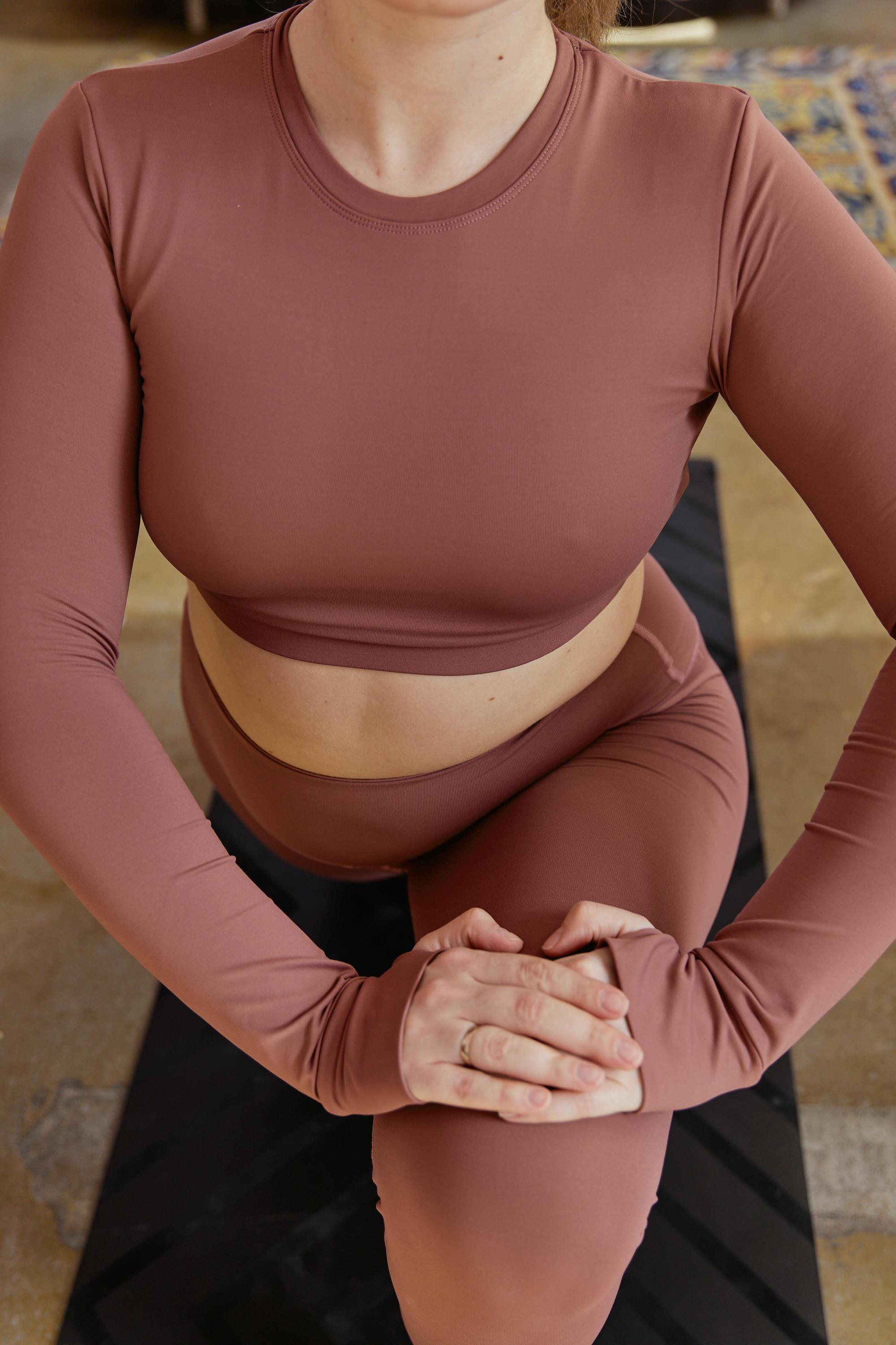 close up photo of a woman stretching her legs