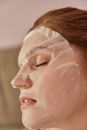 Woman With White Cream on Face