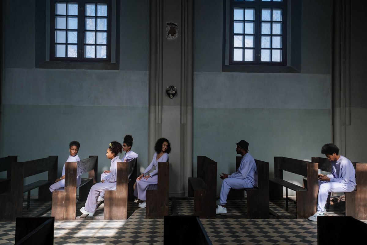 Choristes en séance d'apprentissage vocal