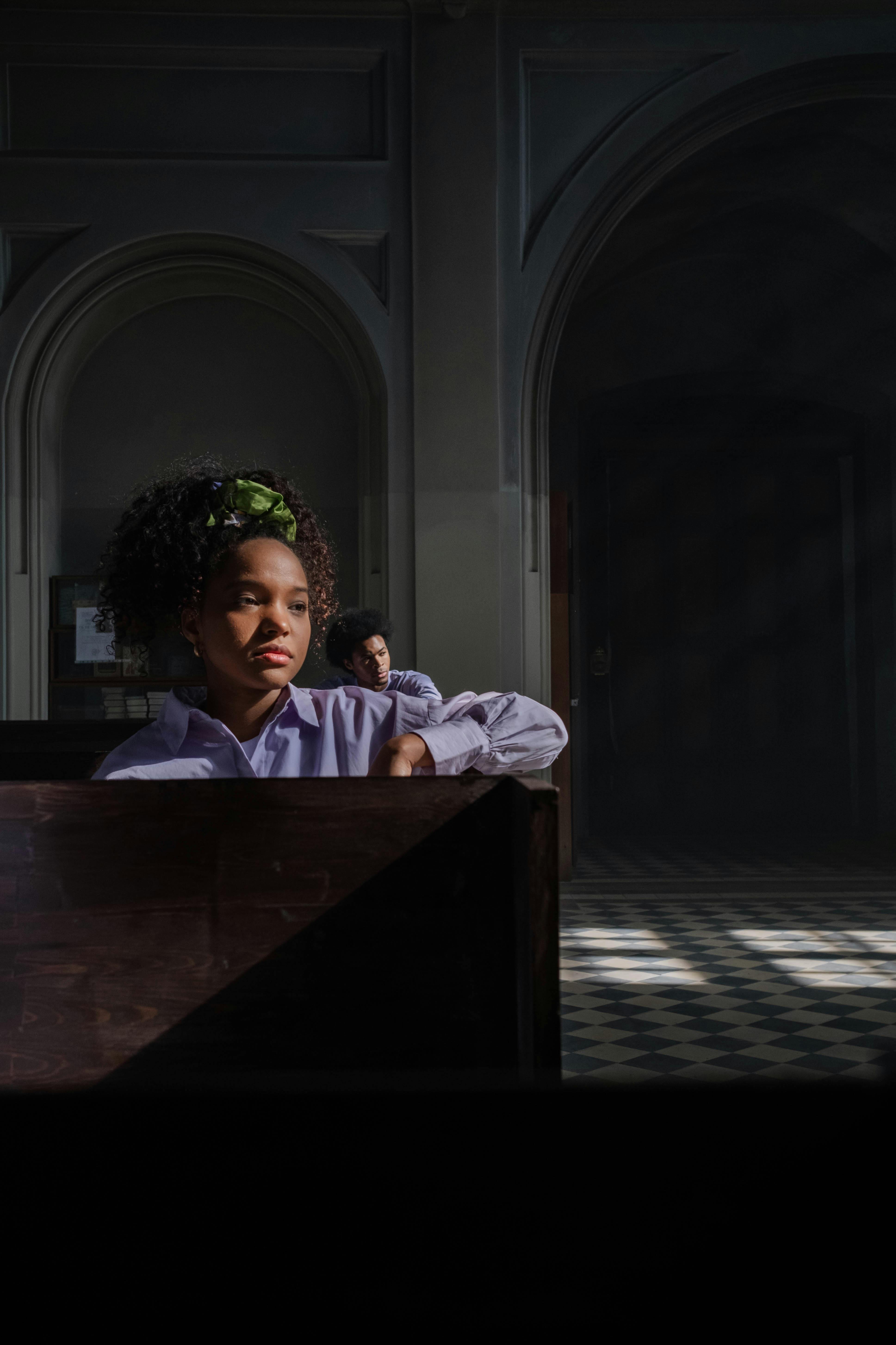 woman sitting inside the church