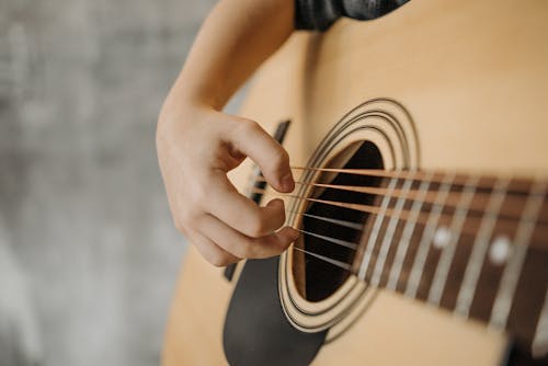 Free Hand Playing Acoustic Guitar  Stock Photo