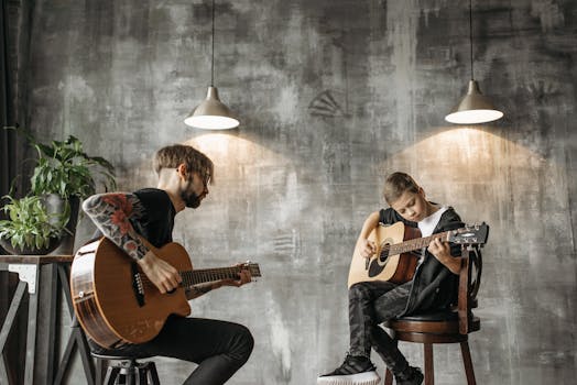 A child and adult participate in an indoor acoustic guitar lesson with a modern artistic backdrop.