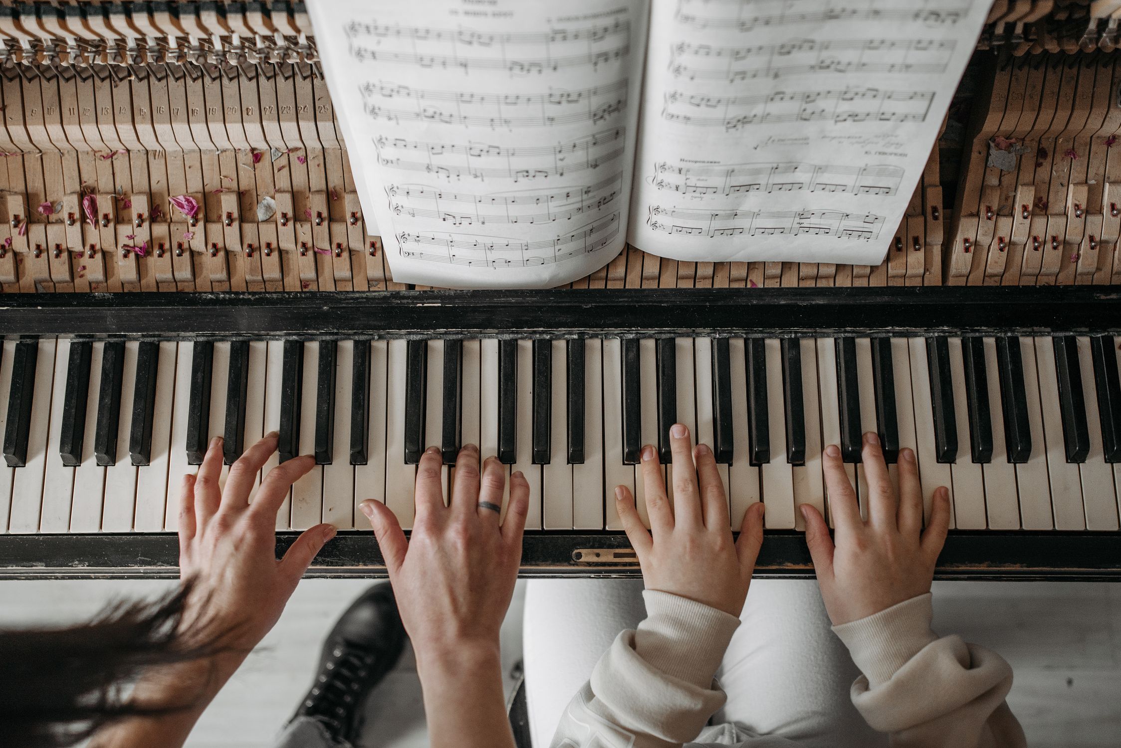 Person Playing Piano With Musical Notes · Free Stock Photo