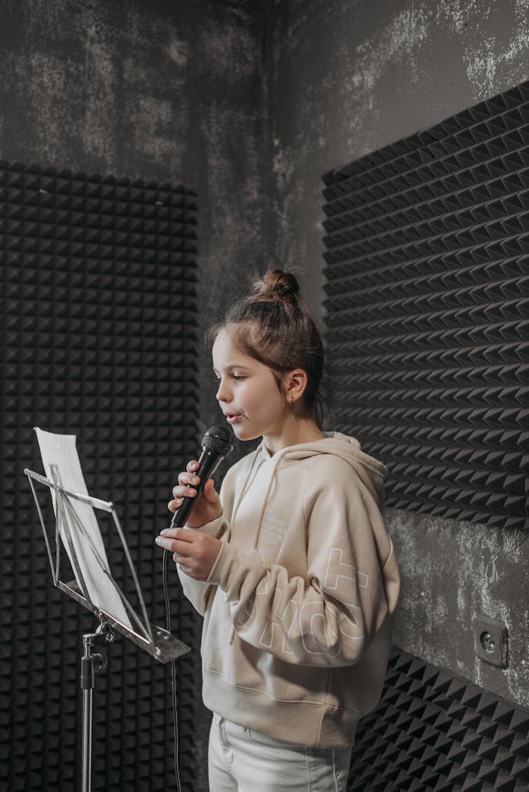 Girl Singing In A Studio