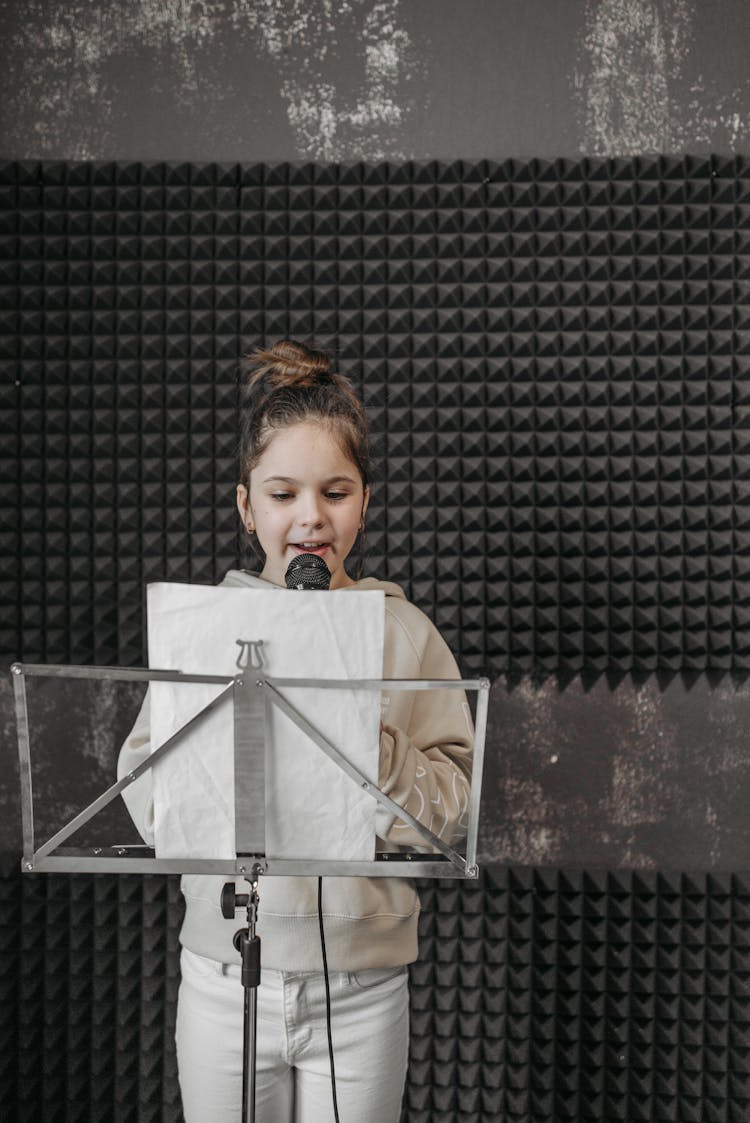 A Girl Singing In A Soundproof Studio