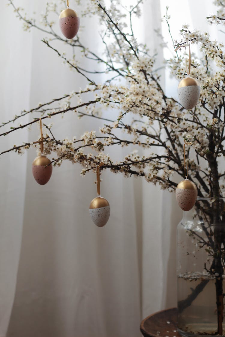 Blooming Tree Twigs Decorated With Egg Shaped Baubles