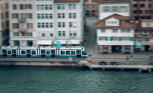 Free stock photo of blue tram, blurry, blurry background