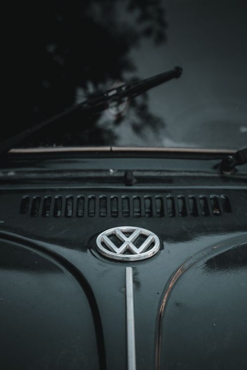 Free Part of shining front end of black retro automobile with hood and windshield Stock Photo