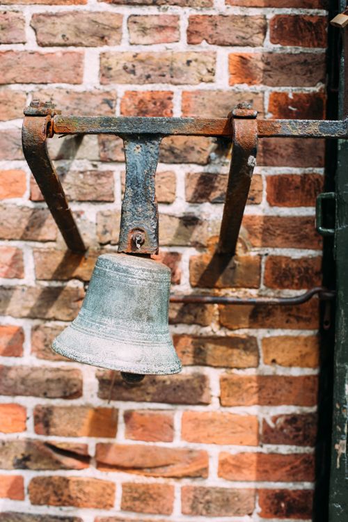 Free stock photo of bell, brick wall Stock Photo