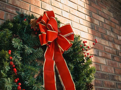 Free Green Christmas Wreath With Red Bow Stock Photo