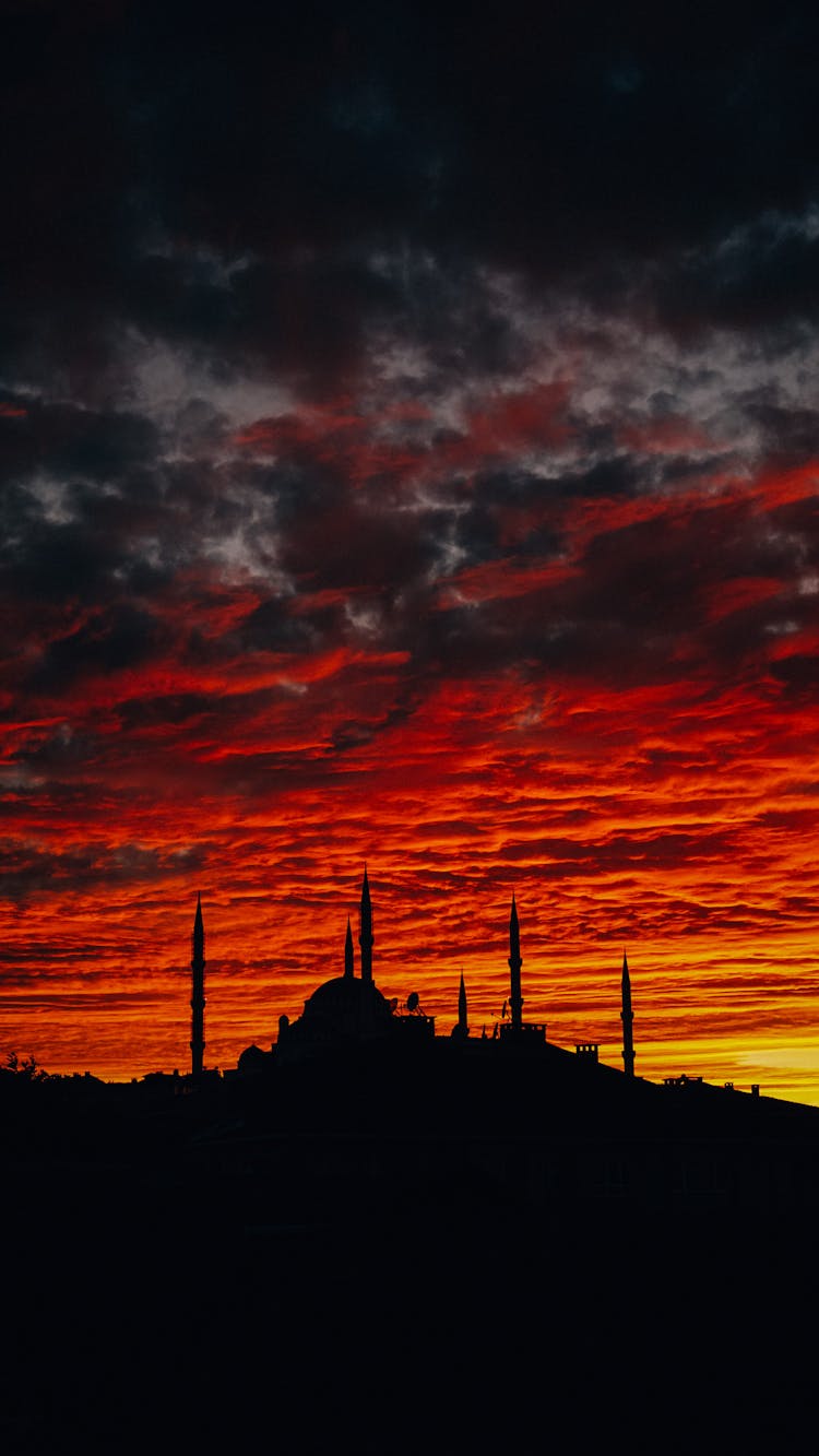 Sunset Sky Above Blue Mosque Silhouette In City