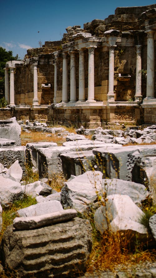 Ancient town with Temple of Apollo and stones