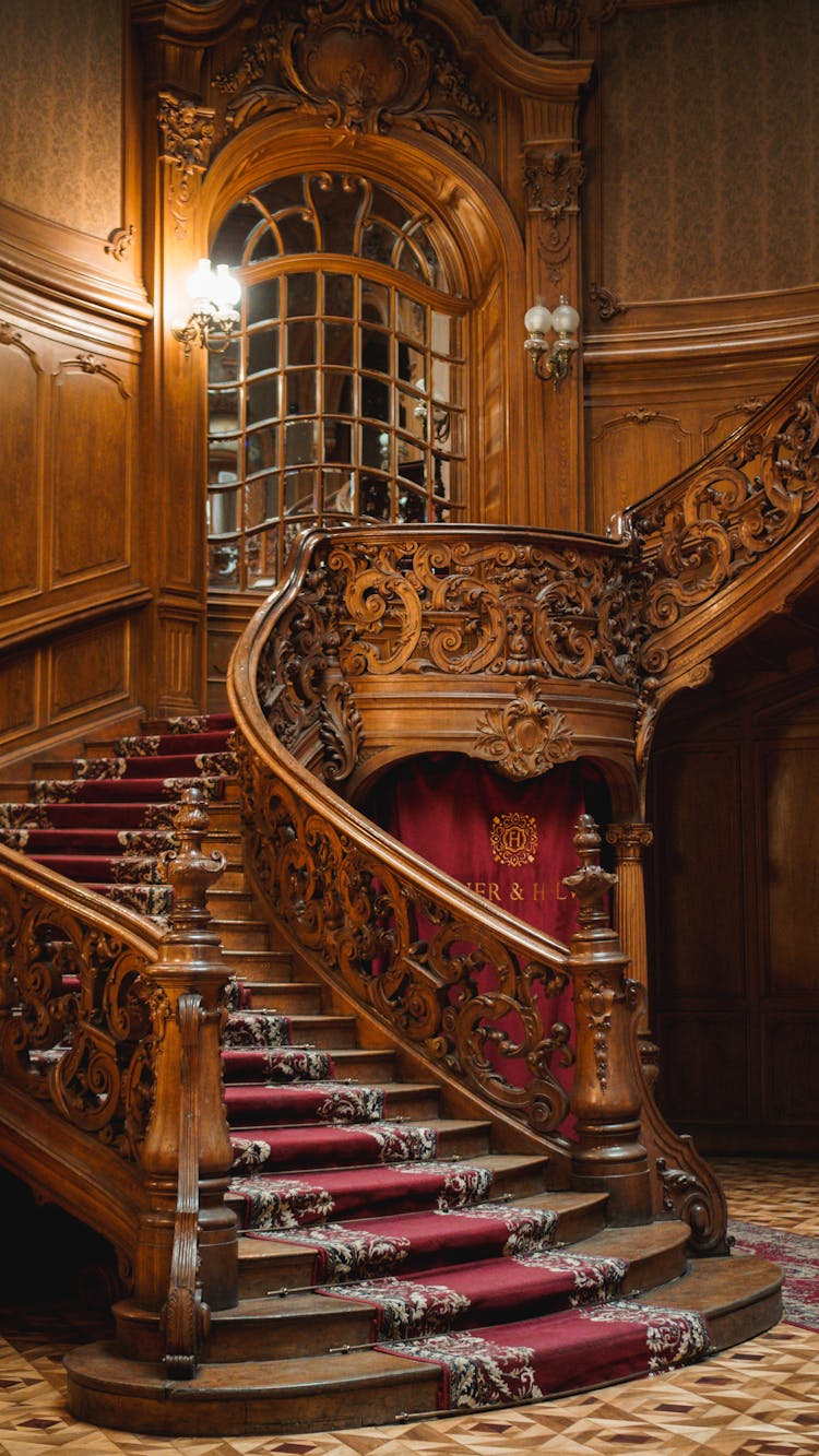 Baroque Building Interior With Decorative Stairs And Shiny Lamps