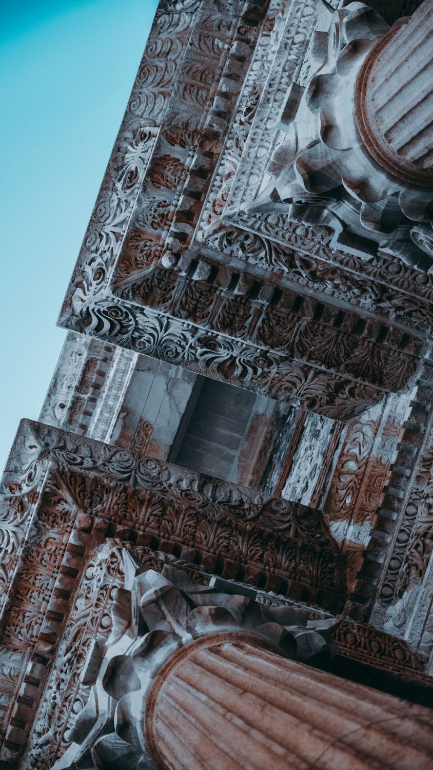 Old stone columns of ancient building · Free Stock Photo