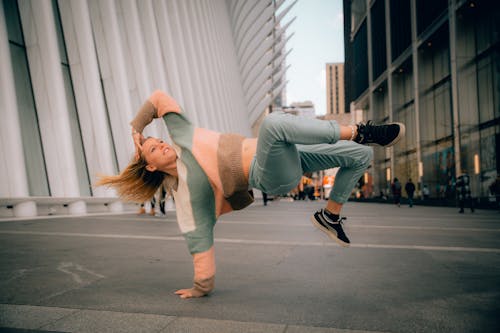 Free Woman Break Dancing in the City  Stock Photo