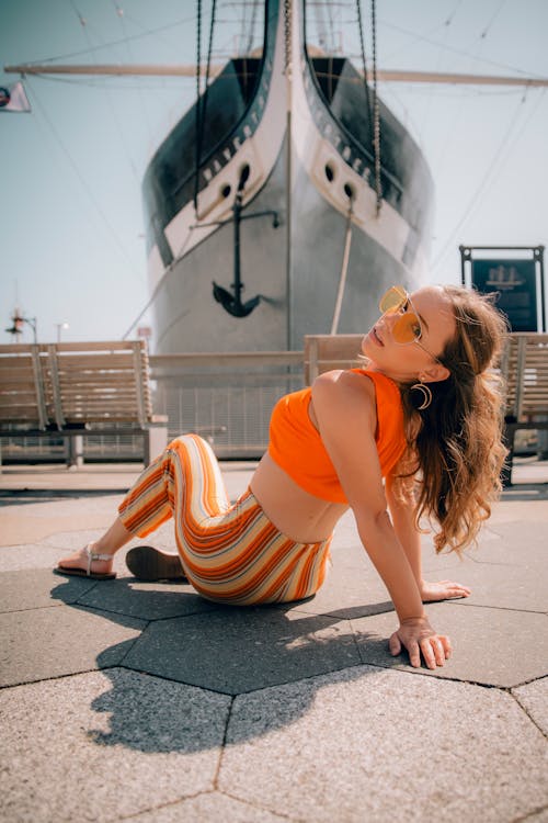 Portrait of a Girl with a Ship in the Background