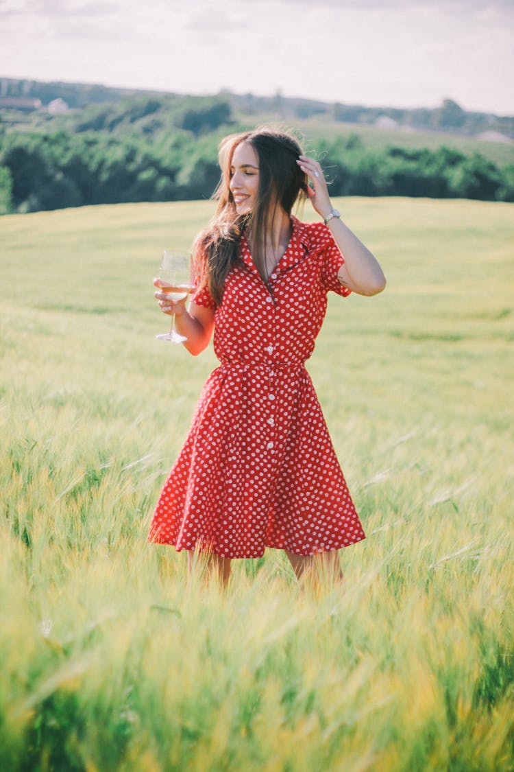 Brunette Woman In Red Polka Dot Dress