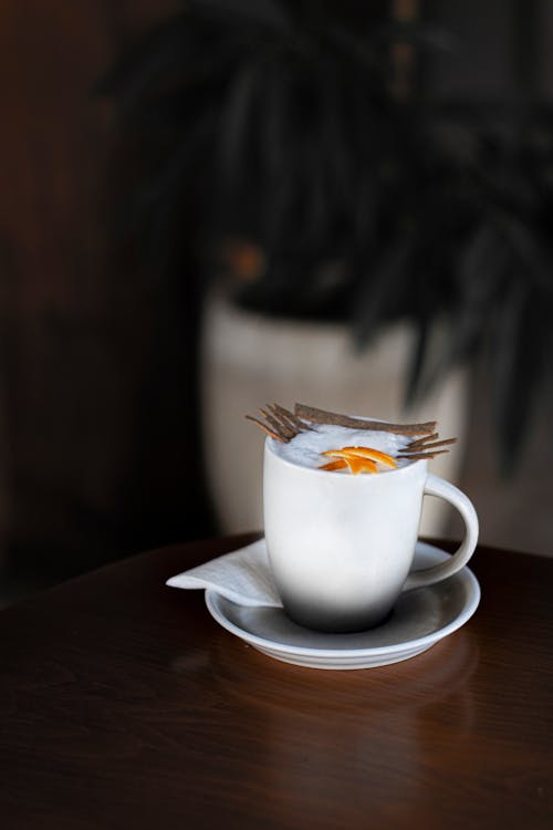 Free White Ceramic Cup and Saucer Stock Photo