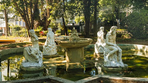 White Statues on Water Fountain