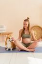 Cute Dog Sitting Beside a Pregnant Woman