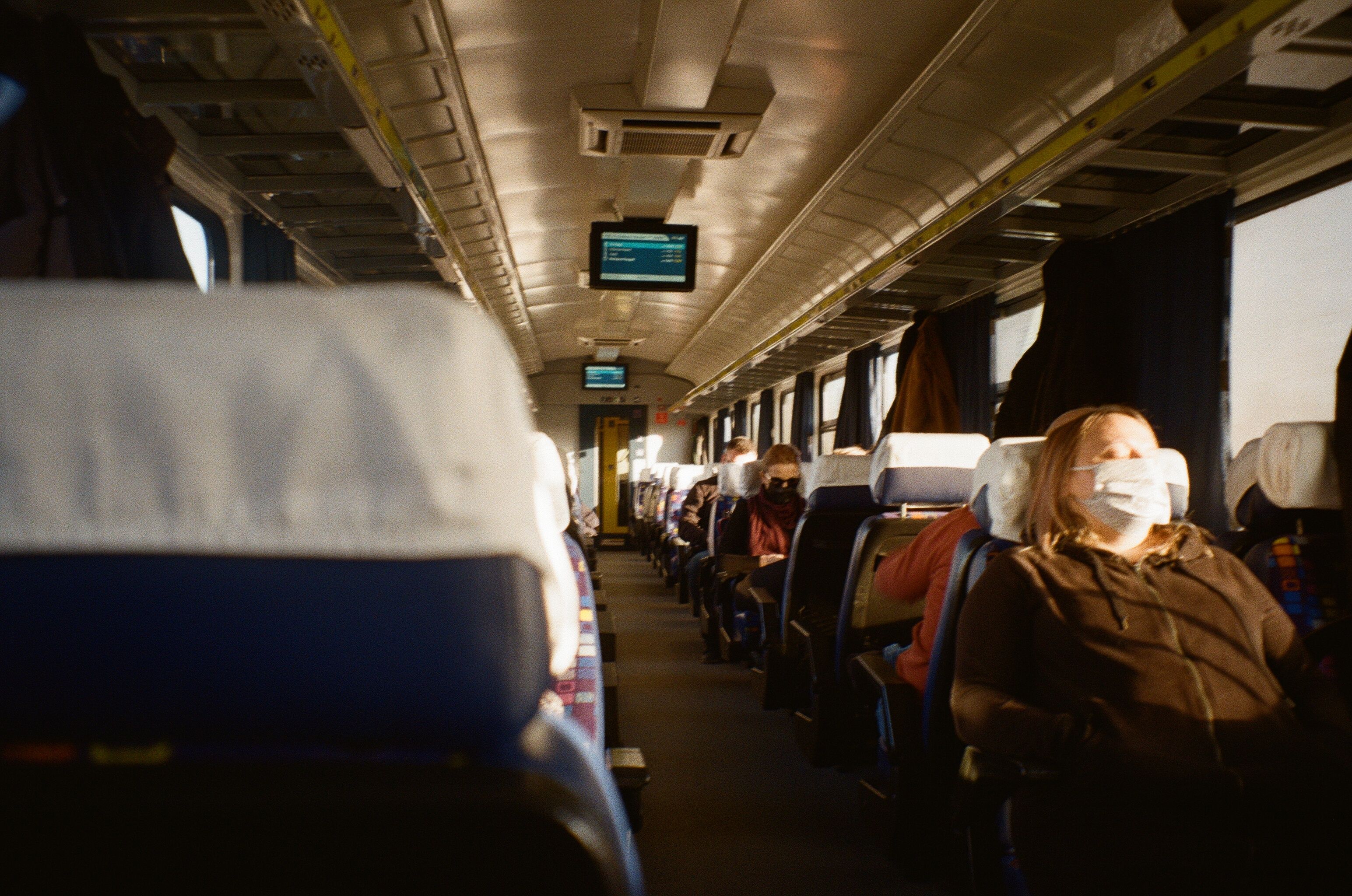 Philadelphia SEPTA train interior with passengers looking frightened during a commotion