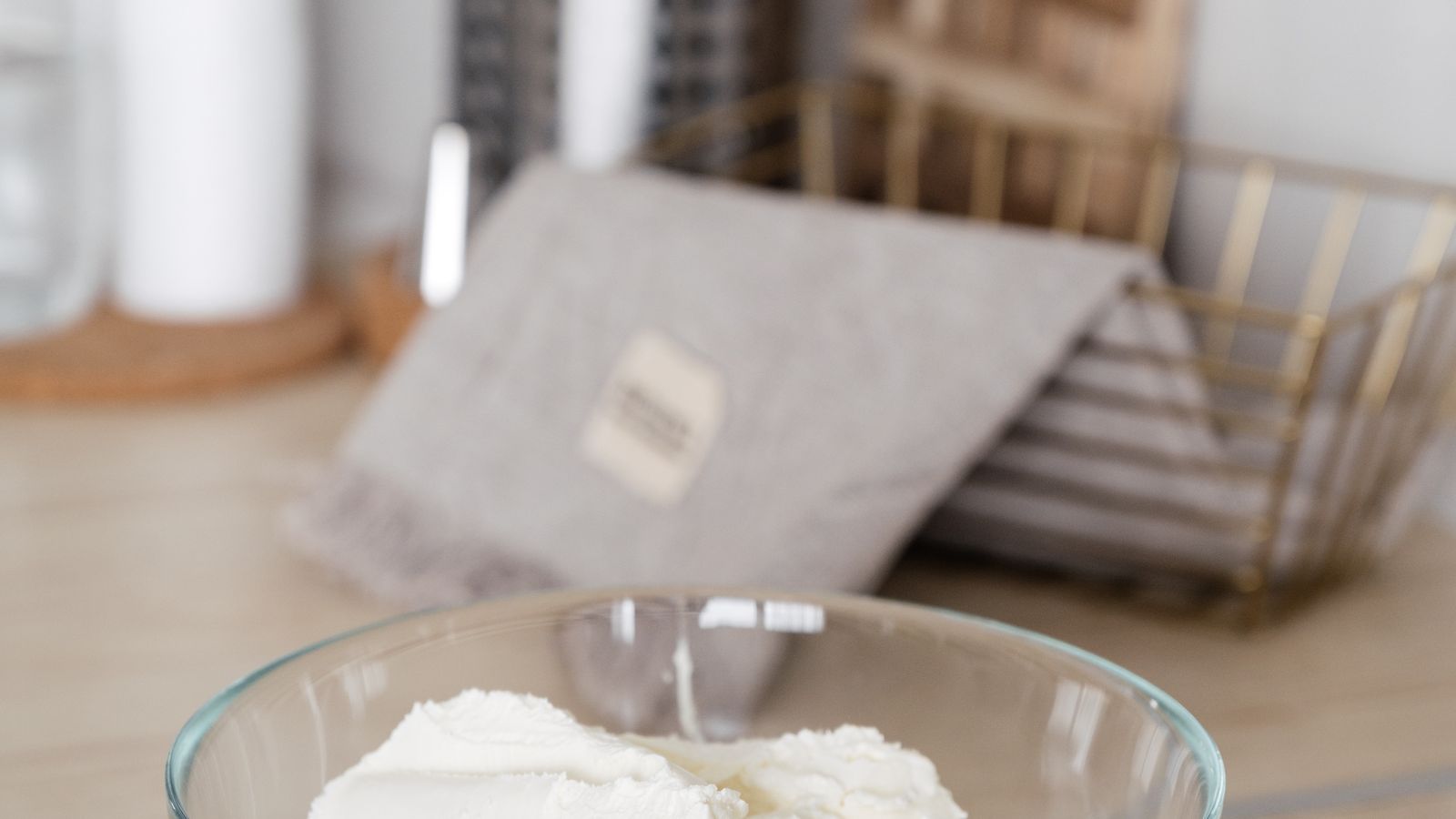 A glass bowl of cream cheese on a wooden counter — photo by SHVETS production on Pexels A glass bowl of cream cheese on a wooden counter