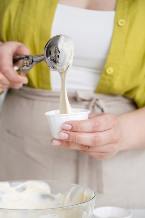 乳液, 冰淇淋勺, 垂直拍攝 的 免費圖庫相片