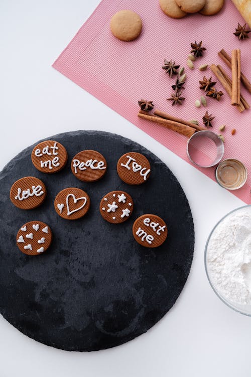 Free Delicious decorated cinnamon cookies placed on plate Stock Photo