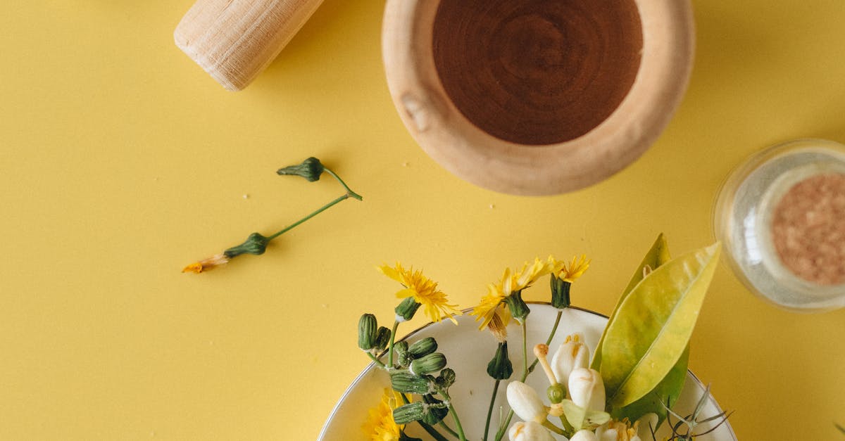 White and Yellow Flowers on Brown Wooden Vase