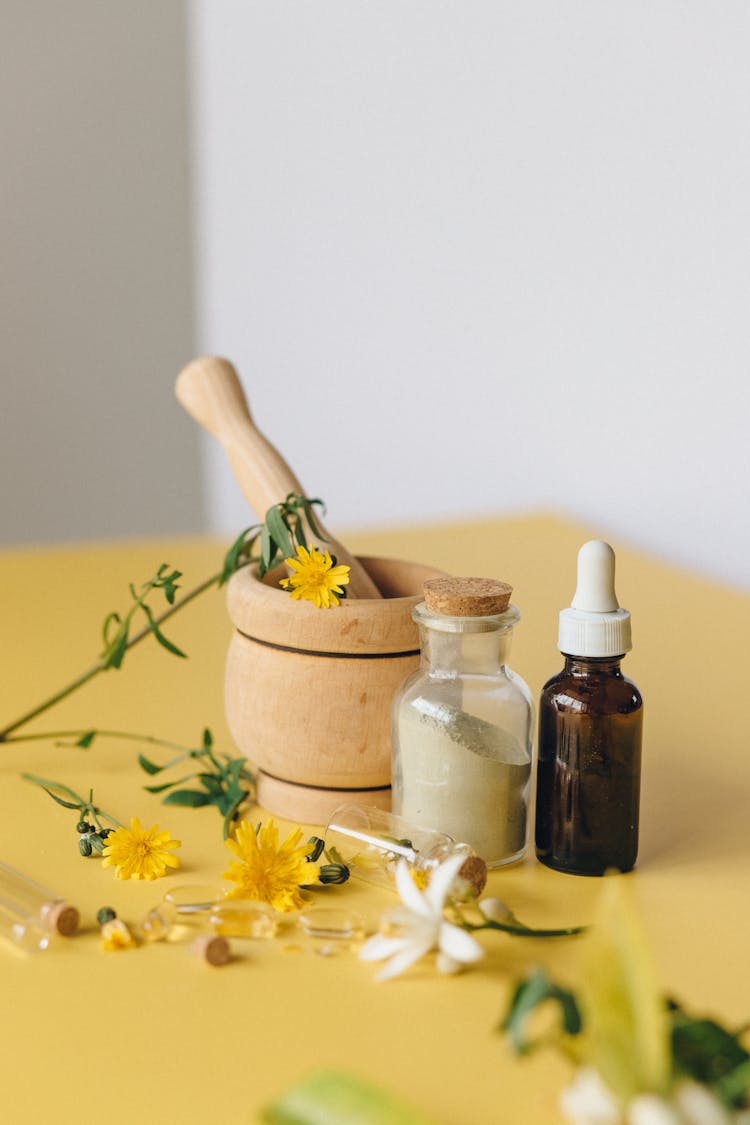 Wooden Mortar And Pestle Used In Extracting Medicinal Flowers