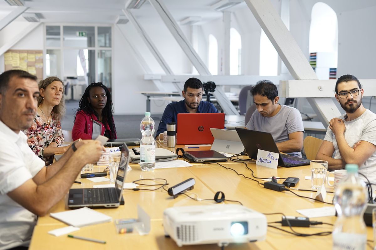 Business team collaborating in a modern office meeting