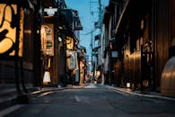 People Walking on a Narrow Alley in Japan