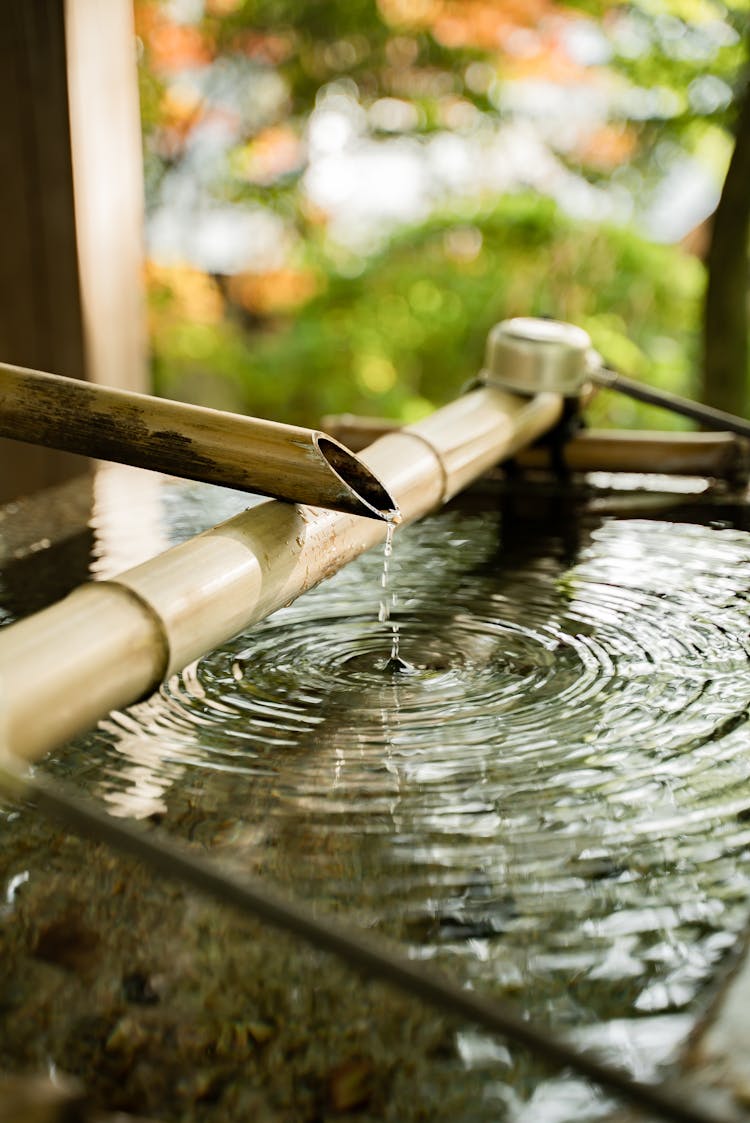 Water Dripping From Traditional Bamboo Fountain