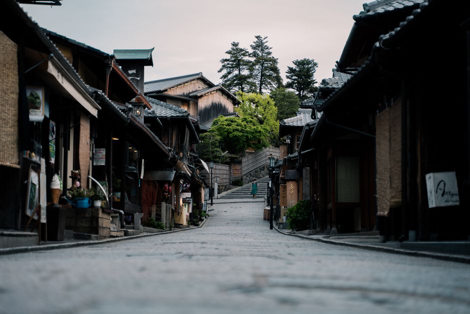 scenic Japanese street with modern architecture and clean walkways - safest countries for black solo female travelers scenic Japanese street with modern architecture and clean walkways - safest countries for black solo female travelers